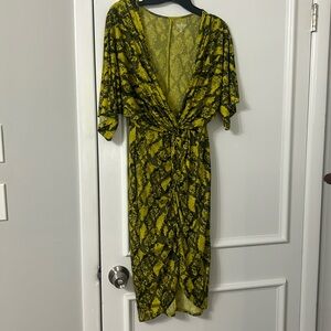 Twist front neon green and black midi dress